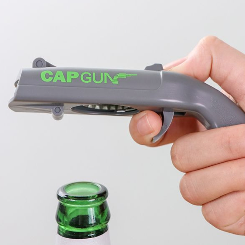Bottle opener, bottle cap launcher, novelty toy