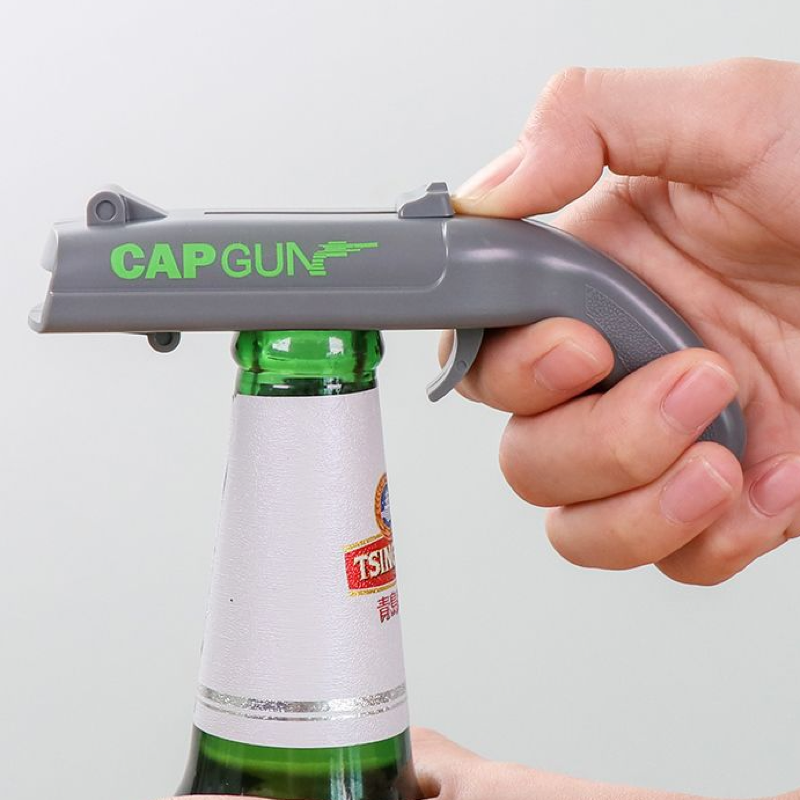 Bottle opener, bottle cap launcher, novelty toy