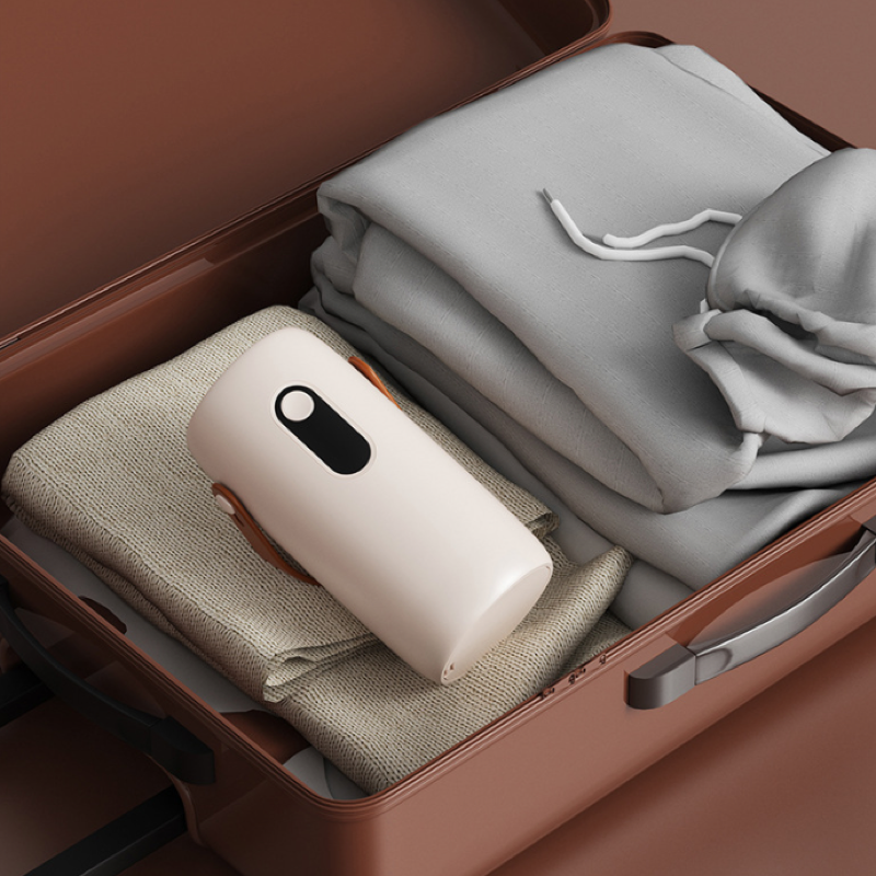 Portable clothes dryer, mini clothes dryer, travel essential.
